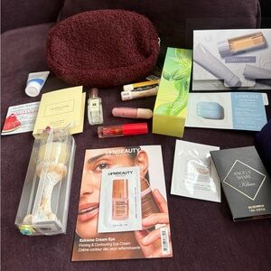 Burgundy Cosmetic Bag with assorted Skincare and Makeup product